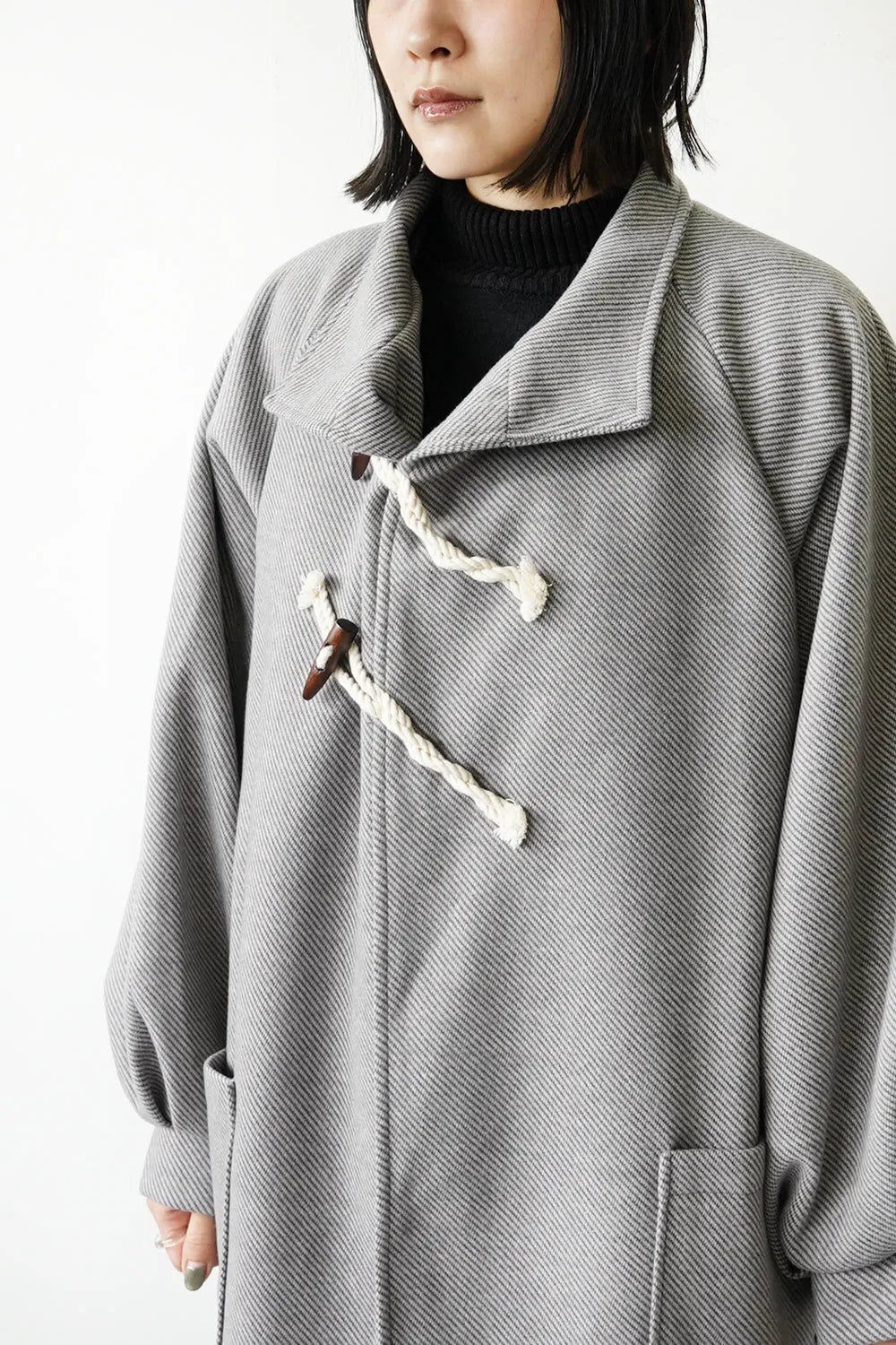 ななめダッフルロングコート