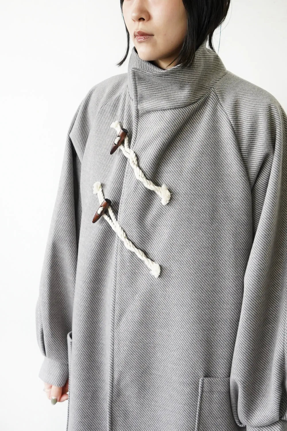 ななめダッフルロングコート