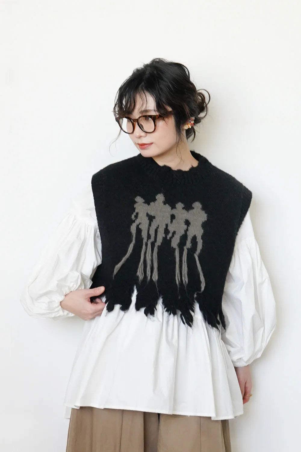 人柄？ダメージニットベスト