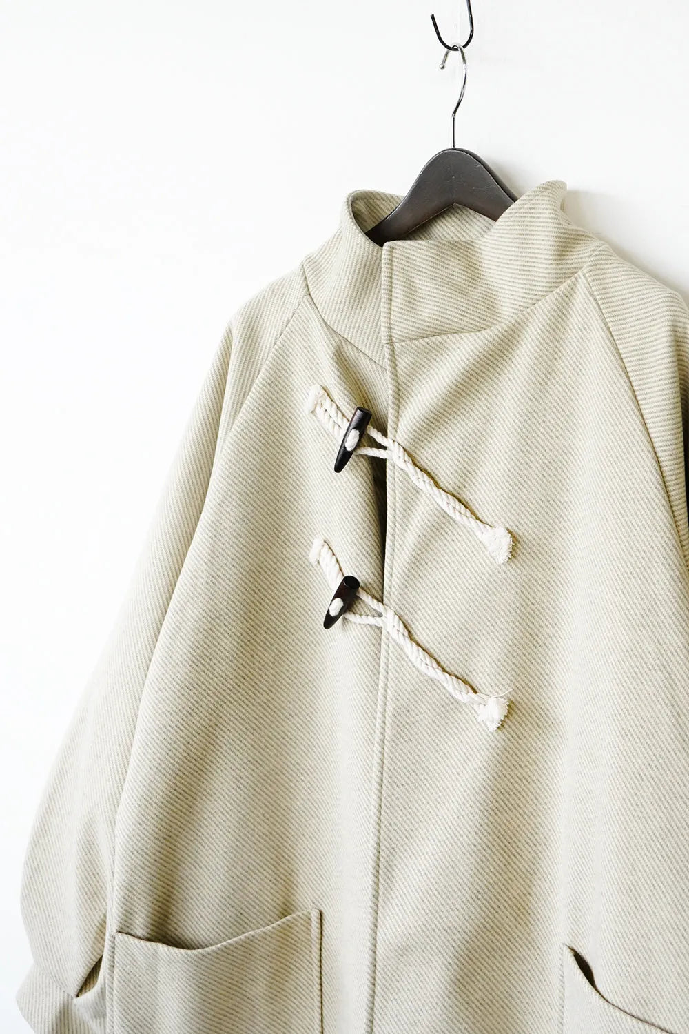 ななめダッフルロングコート