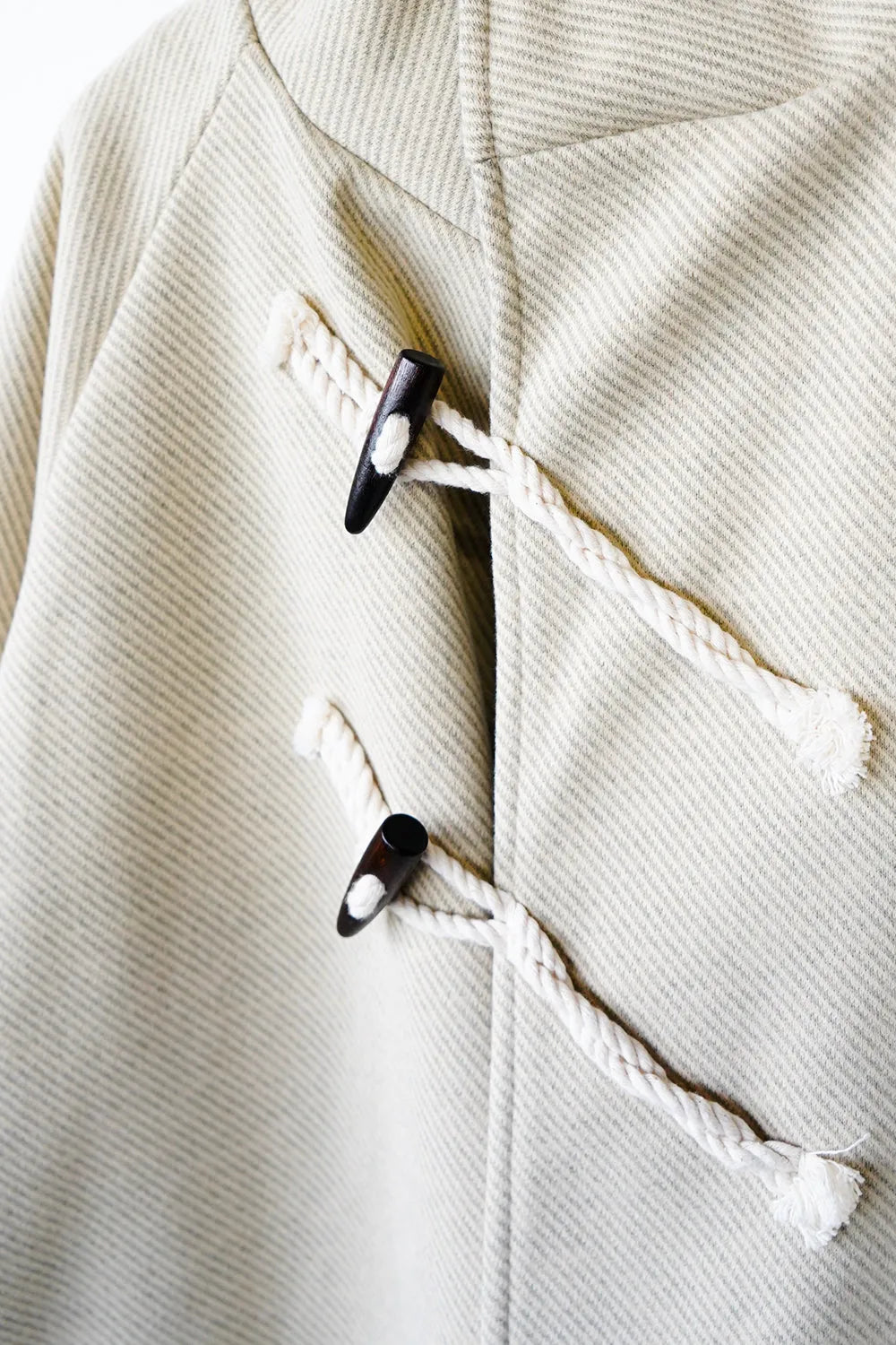 ななめダッフルロングコート