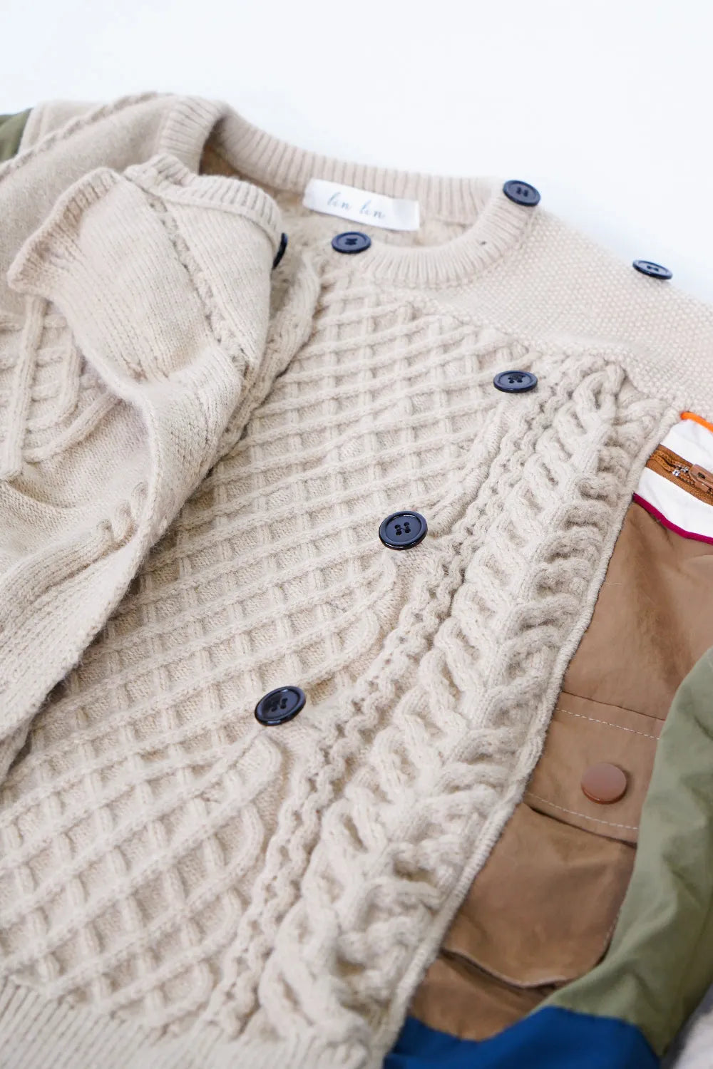 異素材ドッキングアシメニットカーデ