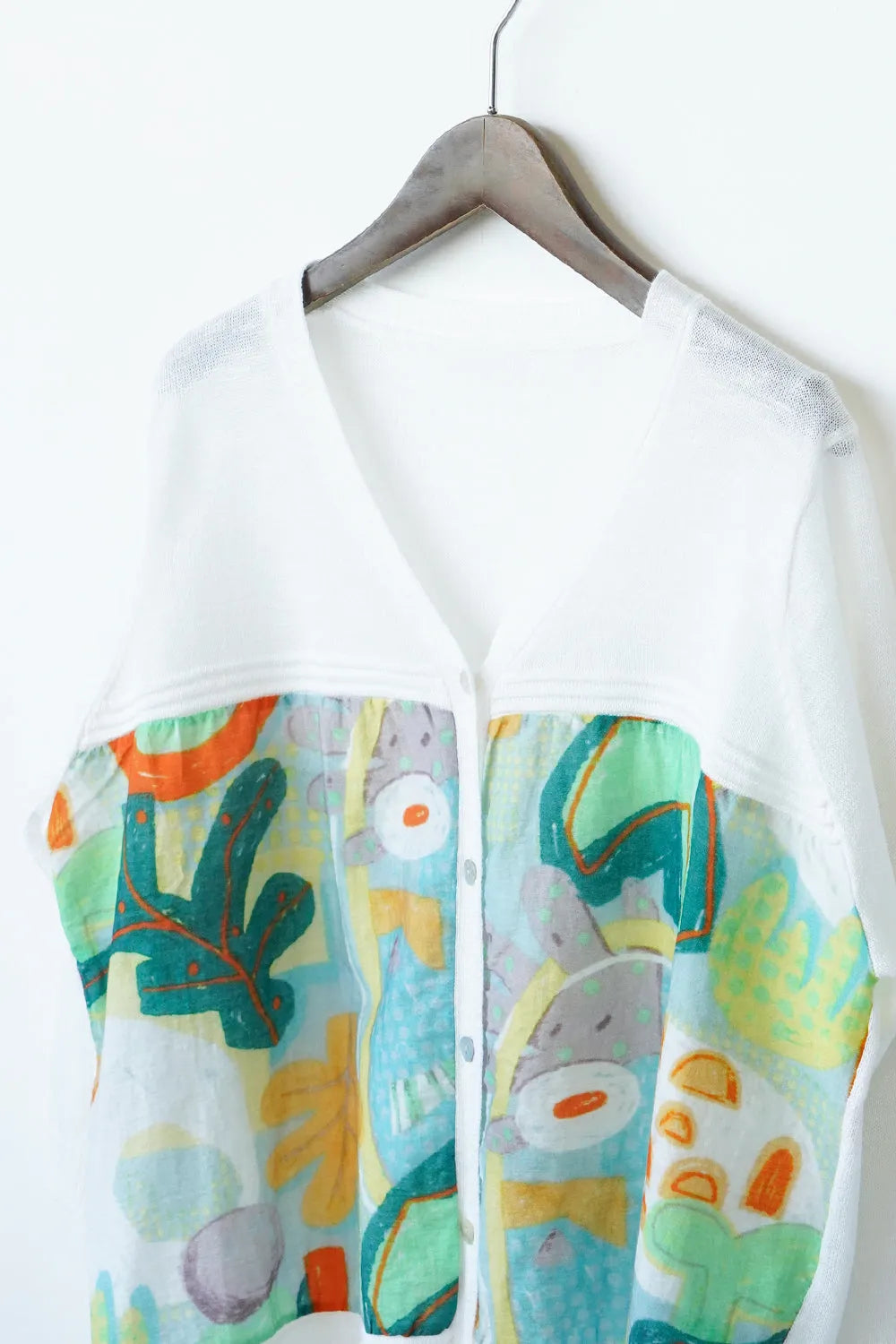 幾何学プリント切替カーデ