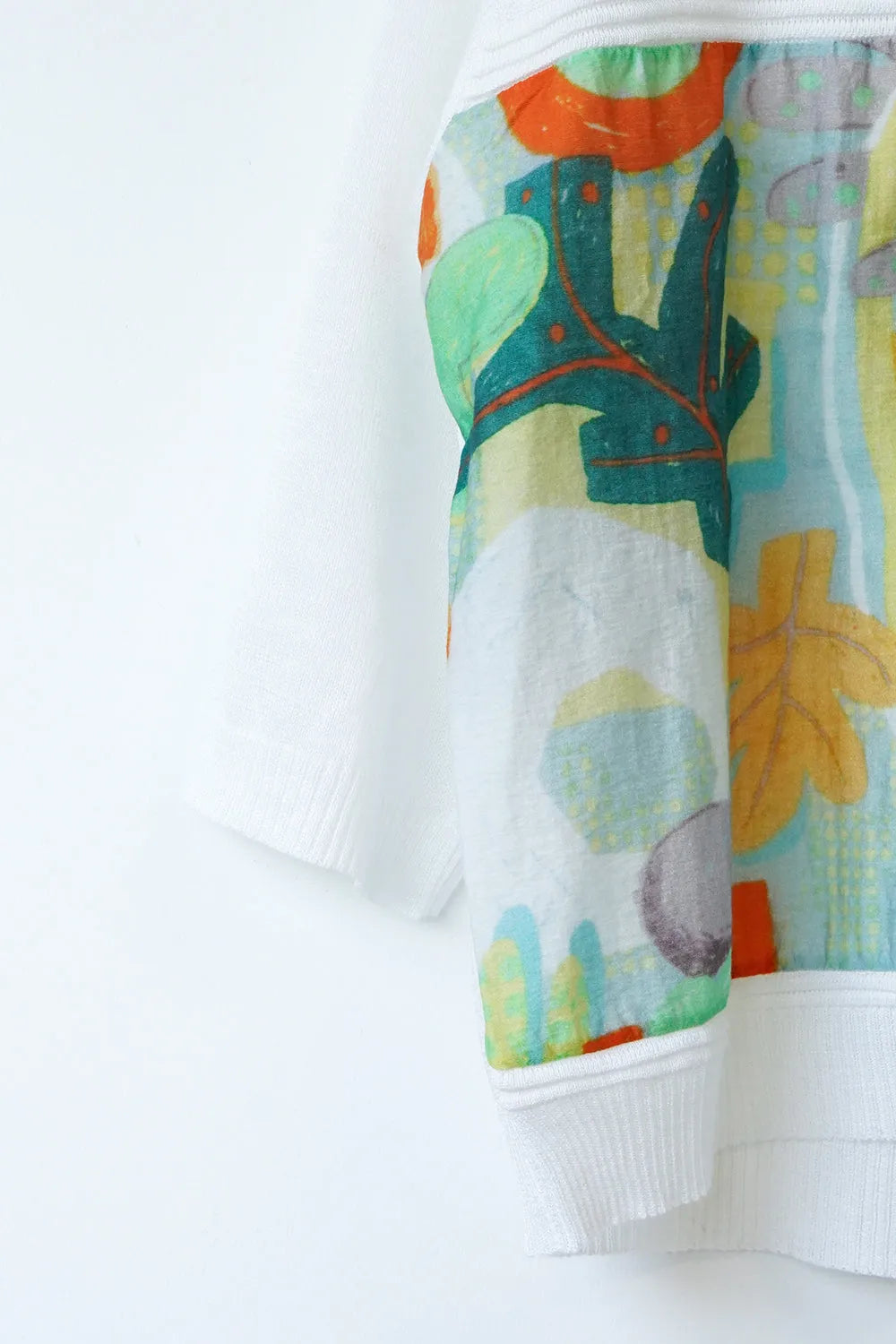 幾何学プリント切替カーデ